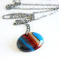 colorful statement pendant necklace in blues and browns