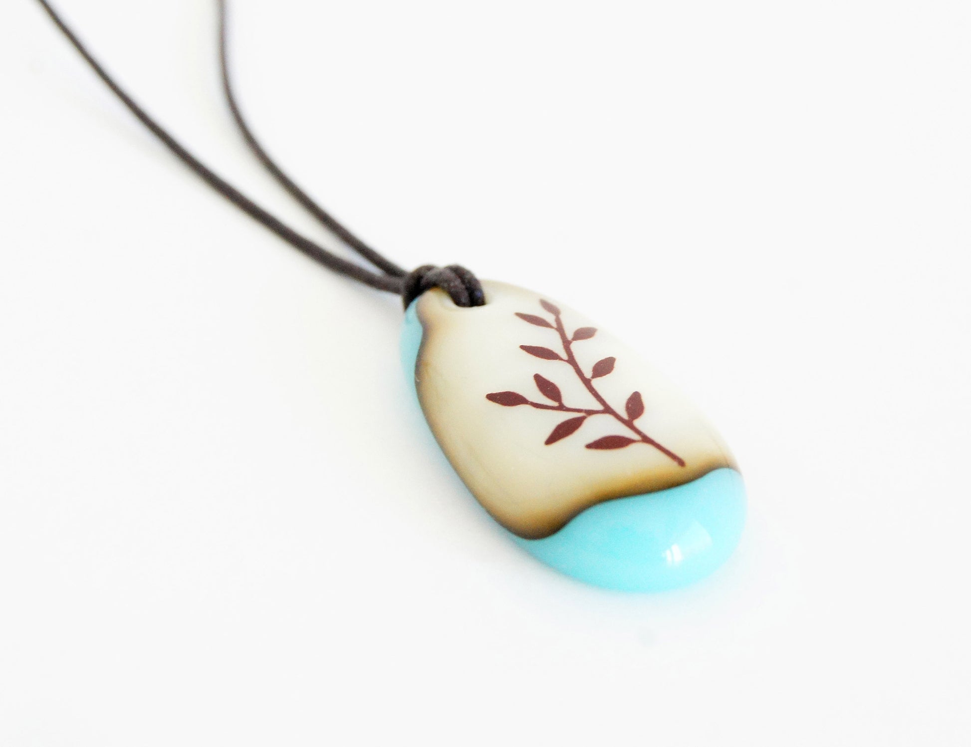 Botanical necklace in vintage colours turquoise glass. 