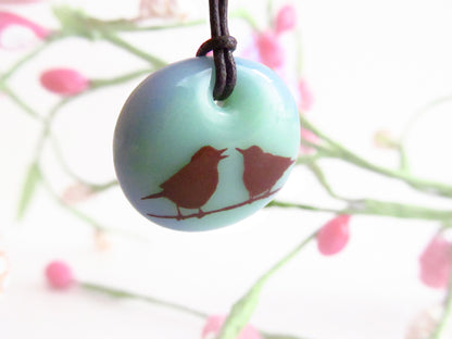 Love birds necklace in pastel green and blue colors. 