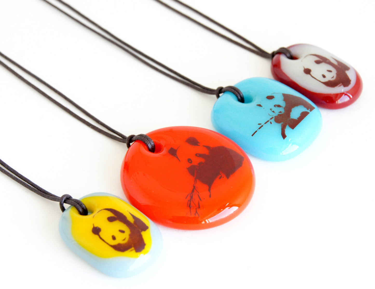 Your choice of handmade panda necklace on cotton cord. 
