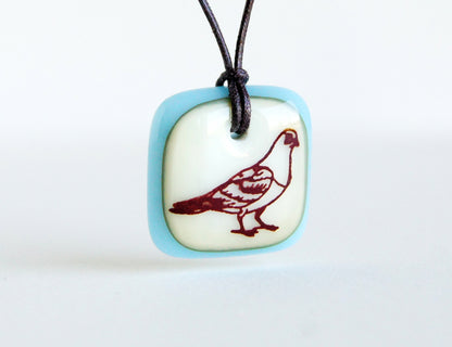 Pigeon necklace in vanilla and ice blue, handmade in glass