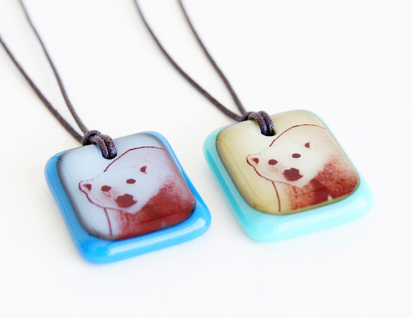 Handmade polar bear photo pendants.
