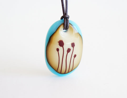 Poppies necklace in aquamarine blue and cream.