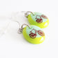 bike earrings handmade in green