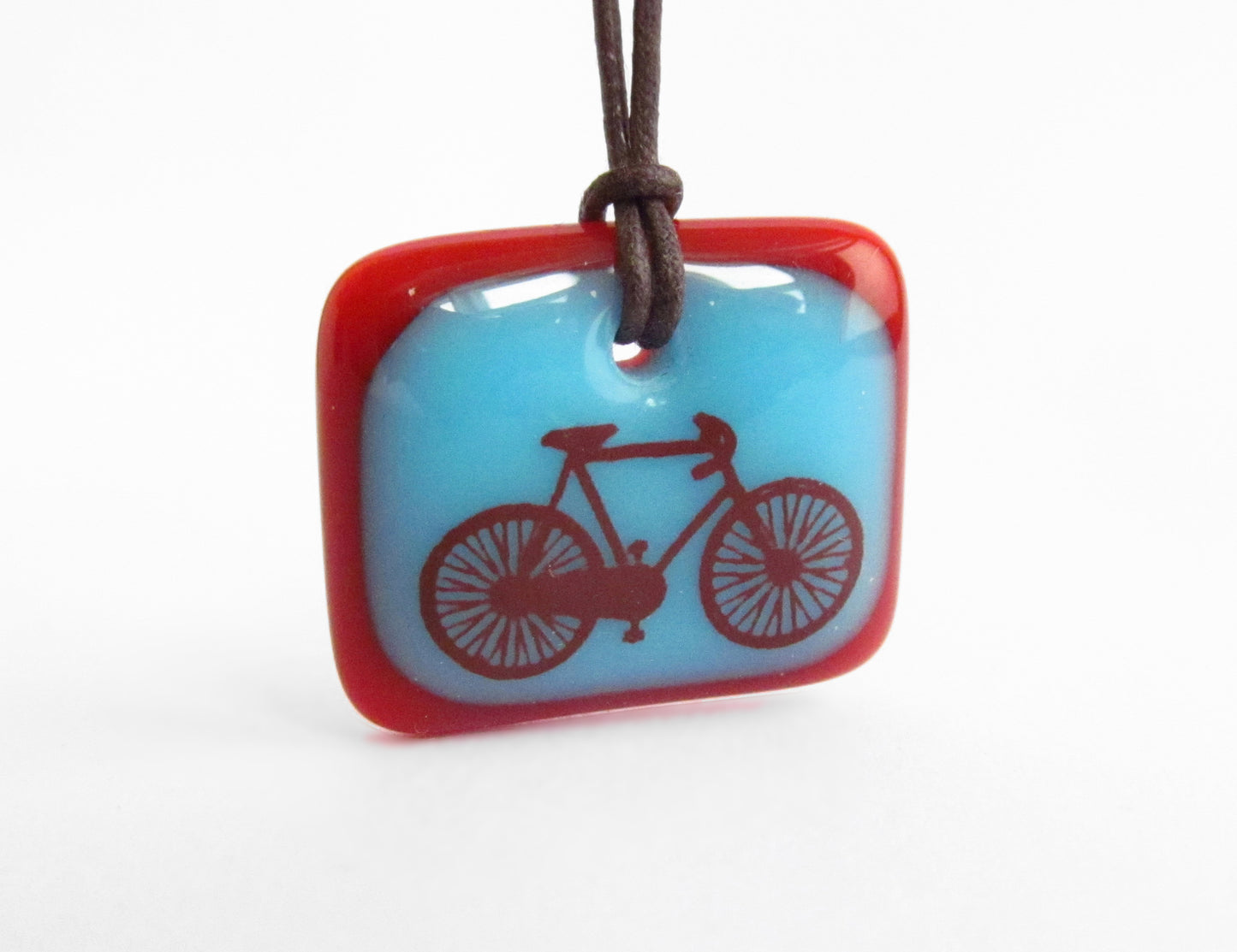 Road bike necklace in olive and jade green colours. 