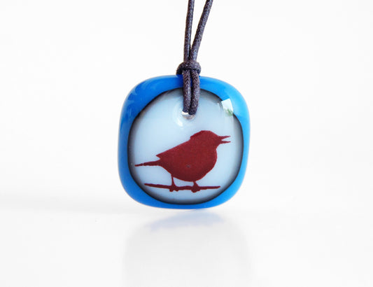 Songbird necklace in royal blue and milk white glass. 