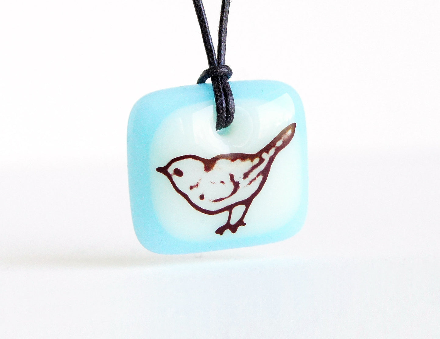 Little bird necklace in ice blue