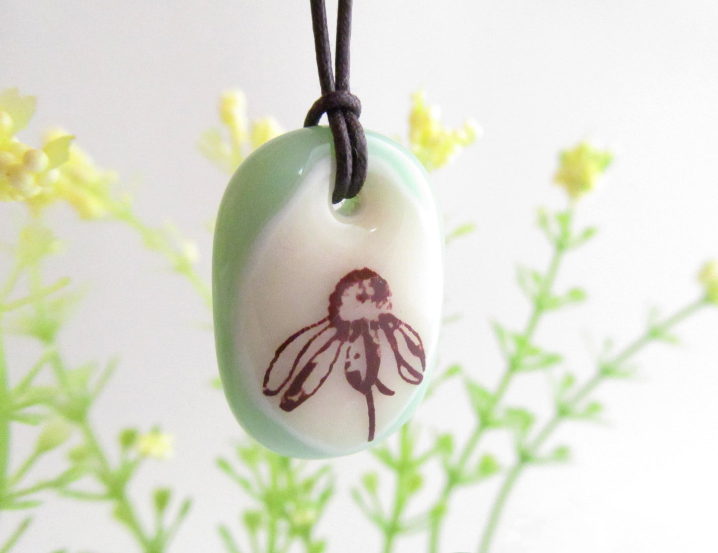 Wildflower necklace in pale green. 