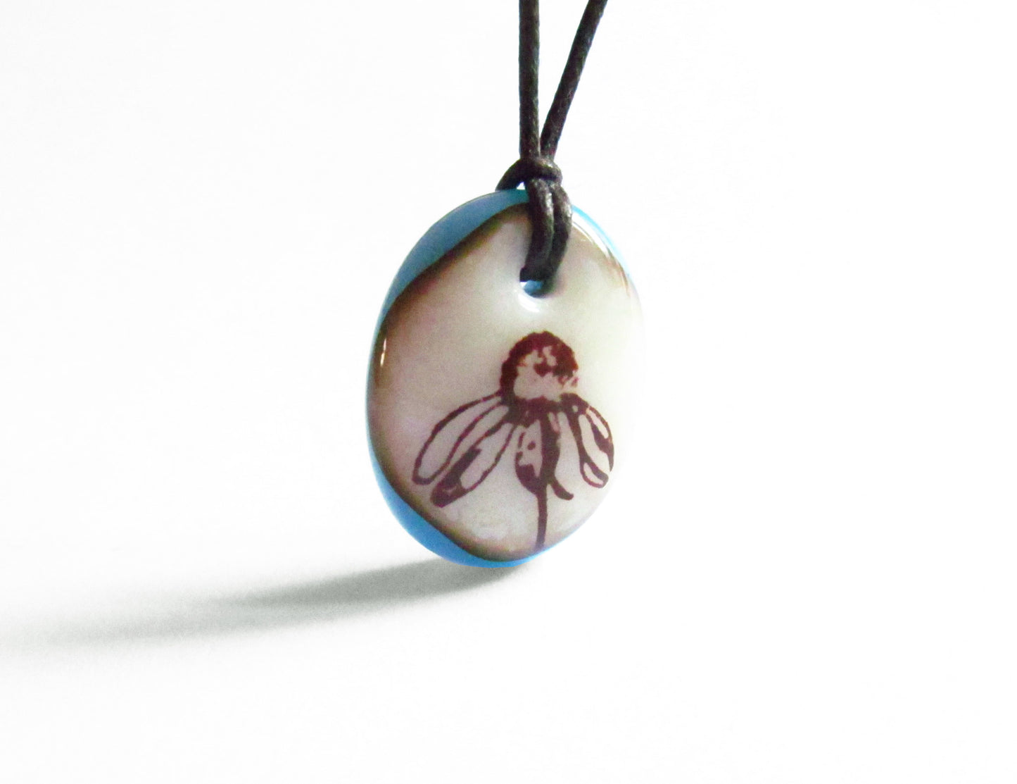 Wildflower Necklace in rustic aqua blue and cream colors. 